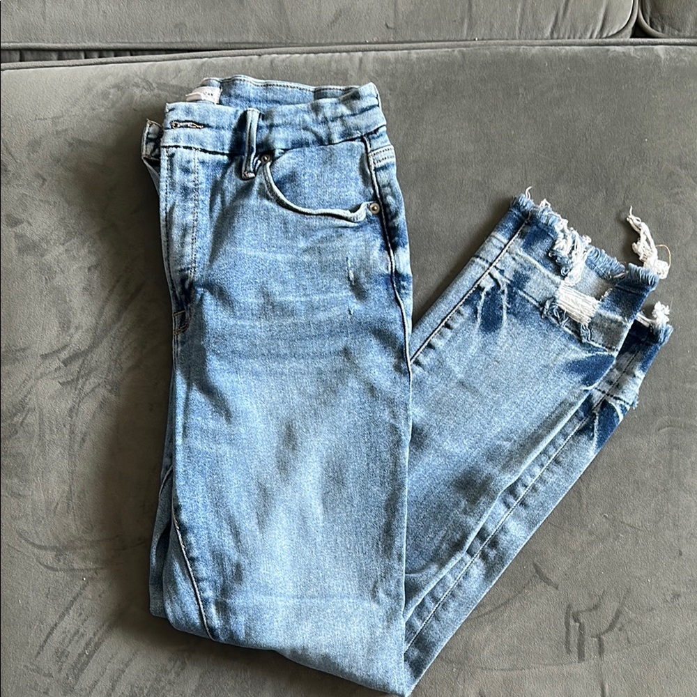 Good American High Rise Blue Jeans with Distressed Details